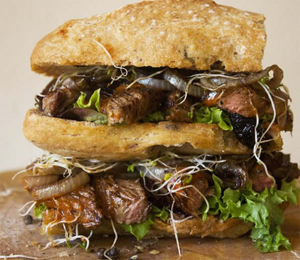 Harissa Steak Rolls with Caramelized Onion