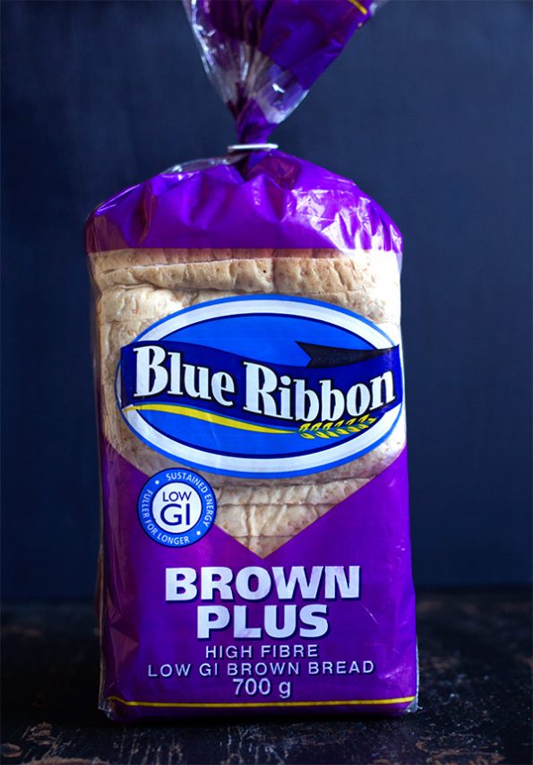 Parsley Butter Chicken Roulade with Spicy Mushrooms, Crispy Onion Rings and Parmesan Toasts